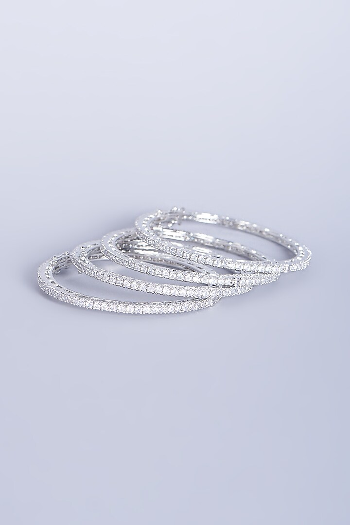 White Finish Zircon Bangles (Set of 4) by Aster at Pernia's Pop Up Shop
