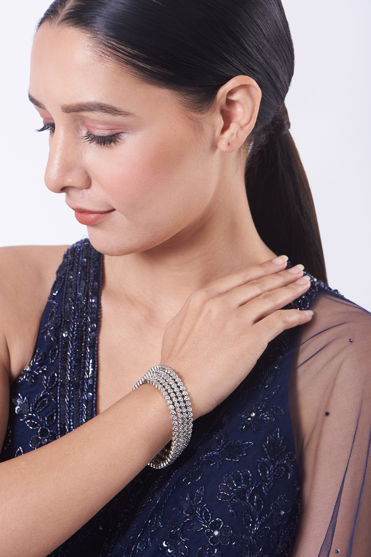 White Finish Zircons Bangles (Set of 4) by Aster at Pernia's Pop Up Shop