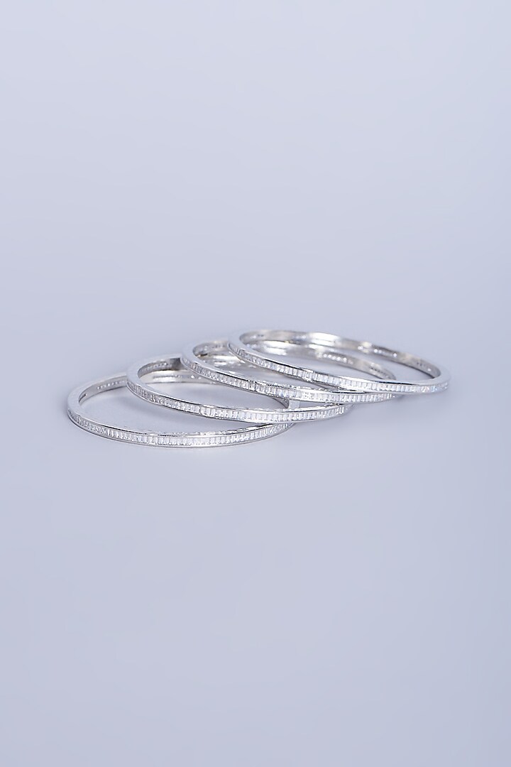 White Finish Mixed Metal Faux Diamonds Bangles (Set of 4) by Aster at Pernia's Pop Up Shop
