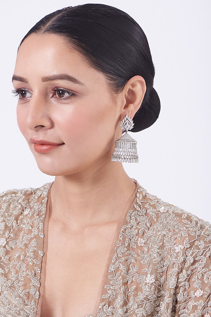 White Finish Faux Diamonds Jhumka Earrings by Aster at Pernia's Pop Up Shop