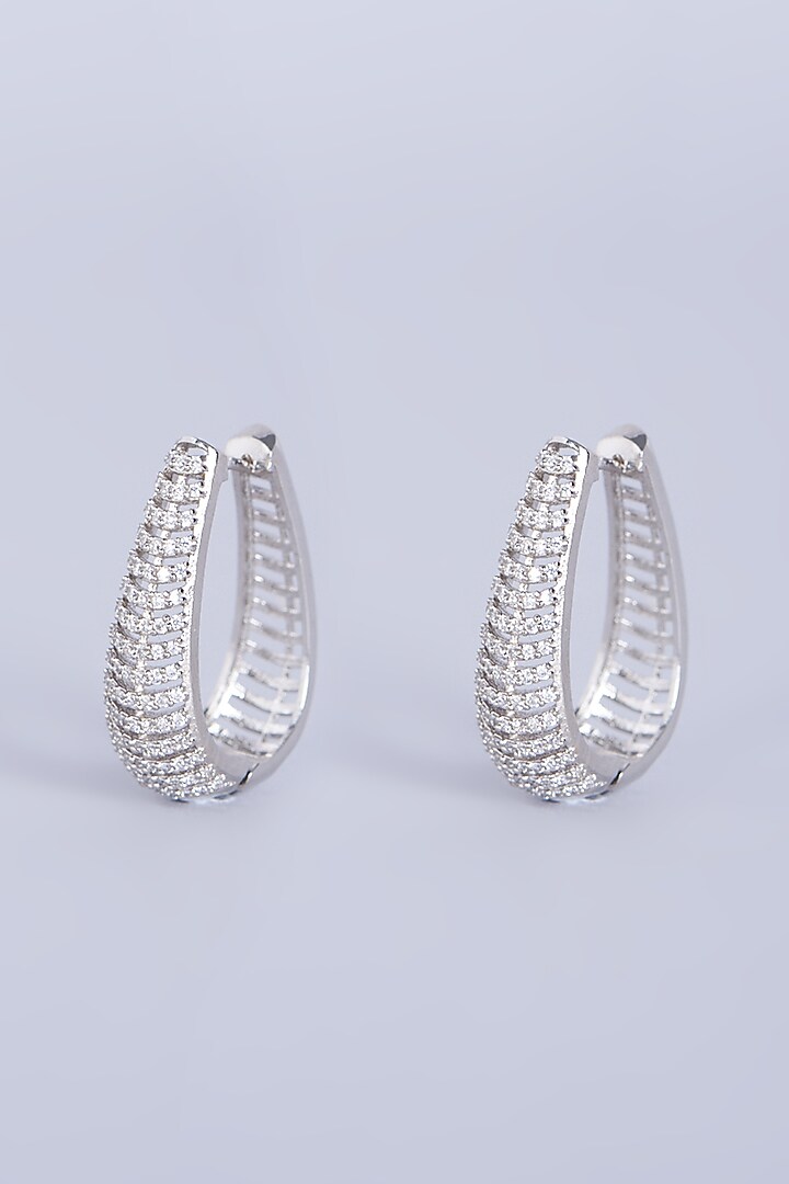 White Finish Zircons & Faux Diamonds Hoop Earrings by Aster at Pernia's Pop Up Shop