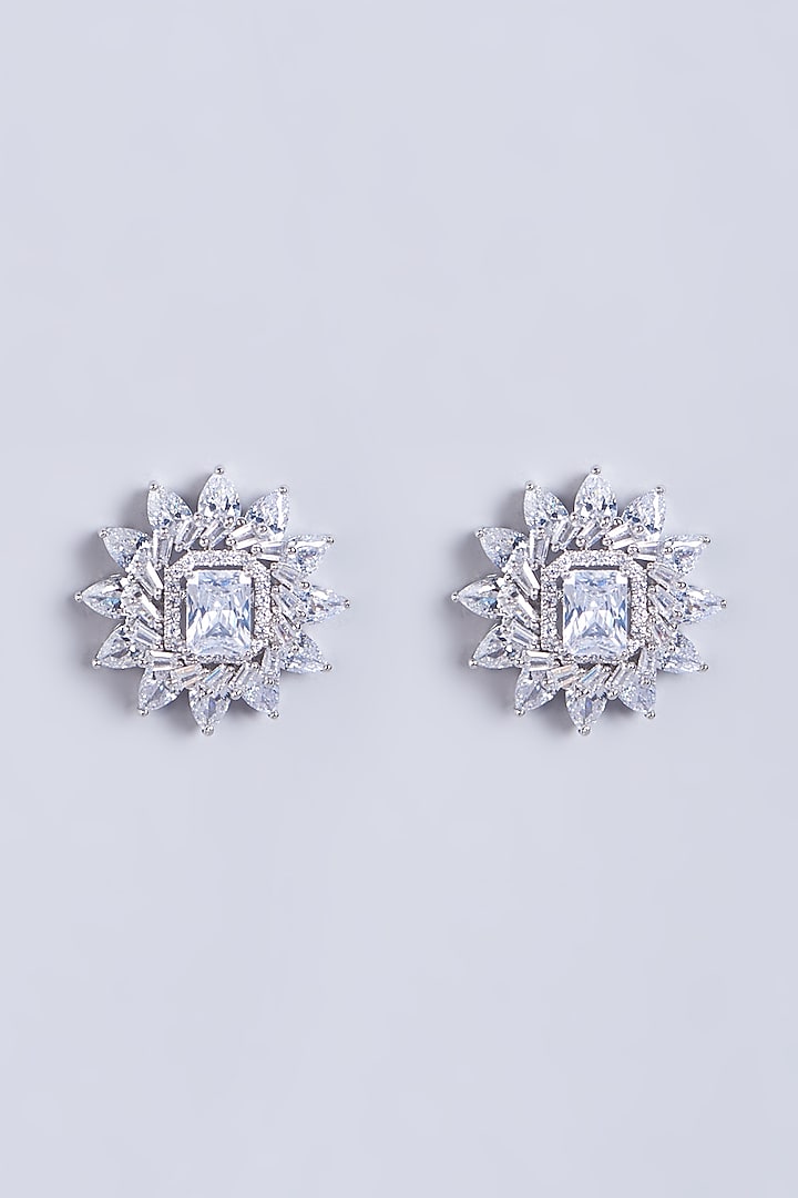 White Finish Faux Diamonds Stud Earrings In Mixed Metal by Aster at Pernia's Pop Up Shop
