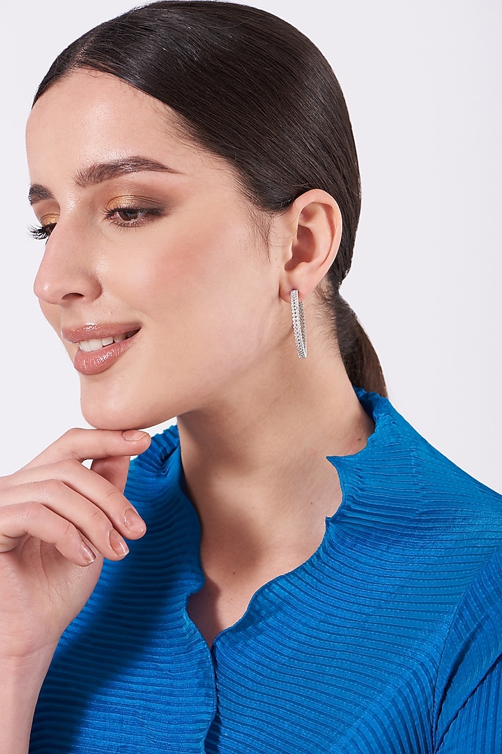 White Finish Faux Diamonds Hoop Earrings by Aster at Pernia's Pop Up Shop