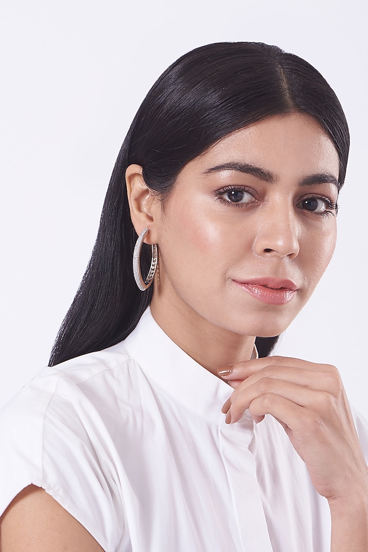 White Finish Faux Diamonds Hoop Earring In Mixed Metal by Aster at Pernia's Pop Up Shop