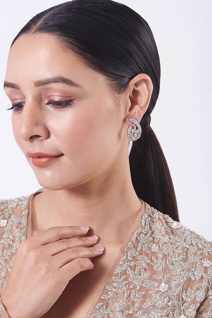 White Finish Faux Diamond Stud Earrings by Aster at Pernia's Pop Up Shop