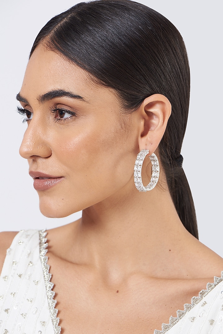 White Finish Faux Diamonds Hoop Earrings by Aster at Pernia's Pop Up Shop