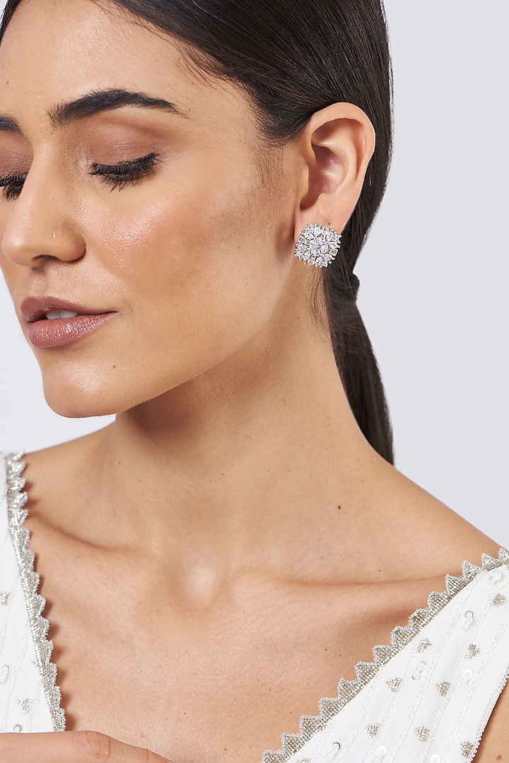 White Finish Stud Earrings With Faux Diamonds by Aster at Pernia's Pop Up Shop