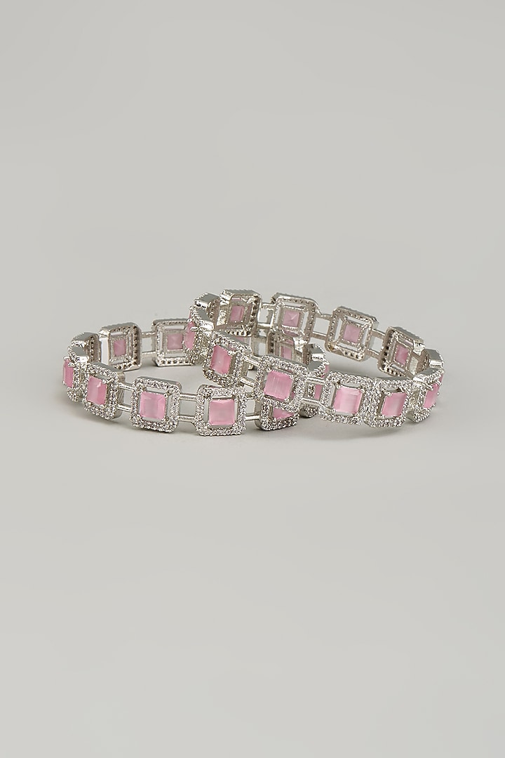 White Finish Zircon & Pink Stone Bangles (Set of 2) by Aster at Pernia's Pop Up Shop