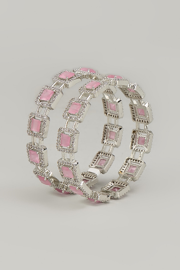 White Finish Zircon & Pink Stone Bangles (Set of 2) by Aster at Pernia's Pop Up Shop