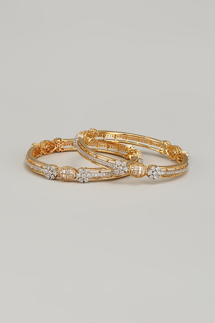 Gold Finish Zircon Bangles (Set of 2) by Aster at Pernia's Pop Up Shop