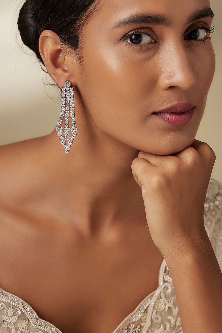 White Finish Zircon Dangler Earrings by Aster at Pernia's Pop Up Shop