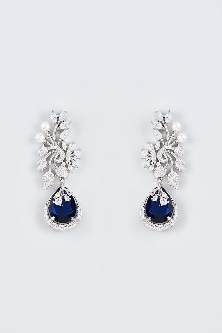 White Finish Zircon & Blue Stone Dangler Earrings by Aster at Pernia's Pop Up Shop