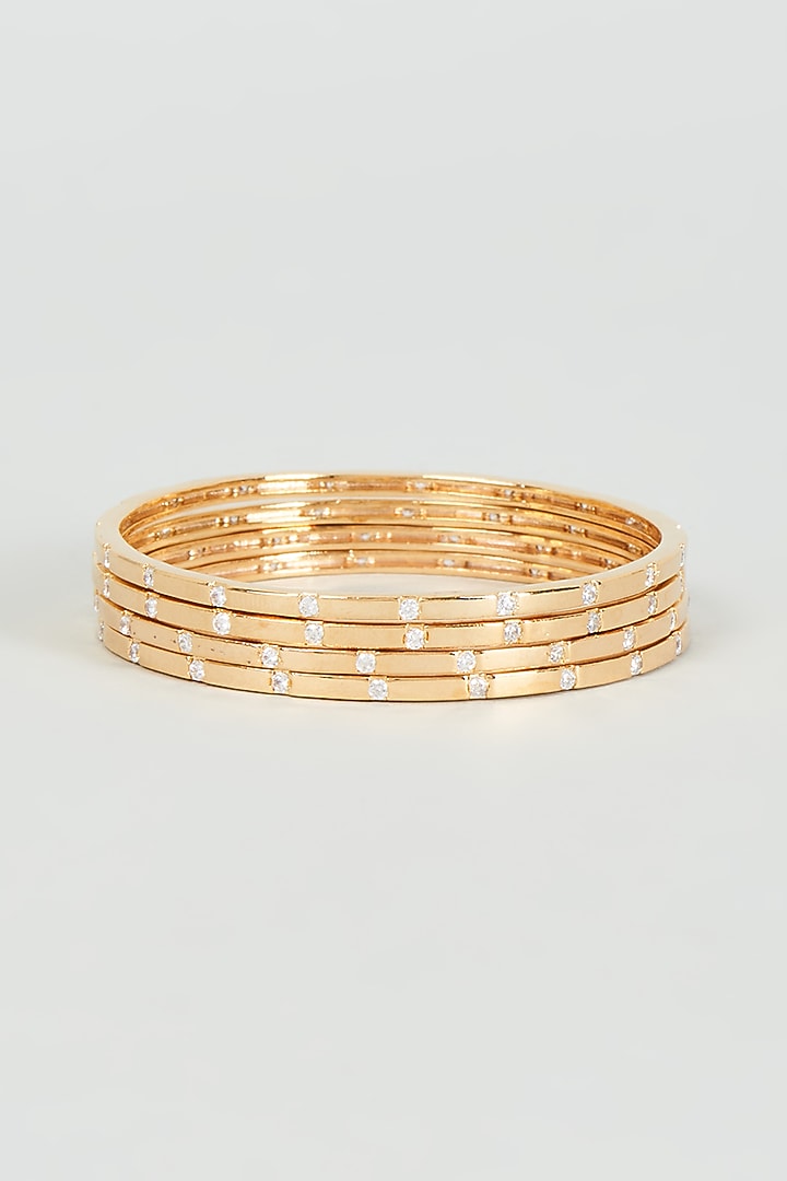 Gold Finish Faux Diamond Bangles (Set Of 4) by Aster at Pernia's Pop Up Shop