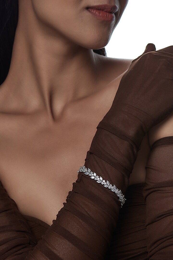 White Finish Faux Diamond Bracelet by Aster at Pernia's Pop Up Shop