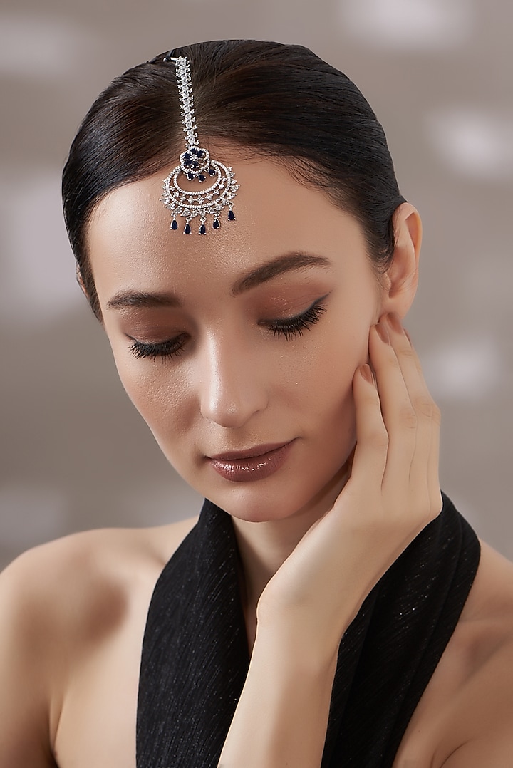 White Finish Faux Diamond & Blue Stone Maangtikka by Aster at Pernia's Pop Up Shop