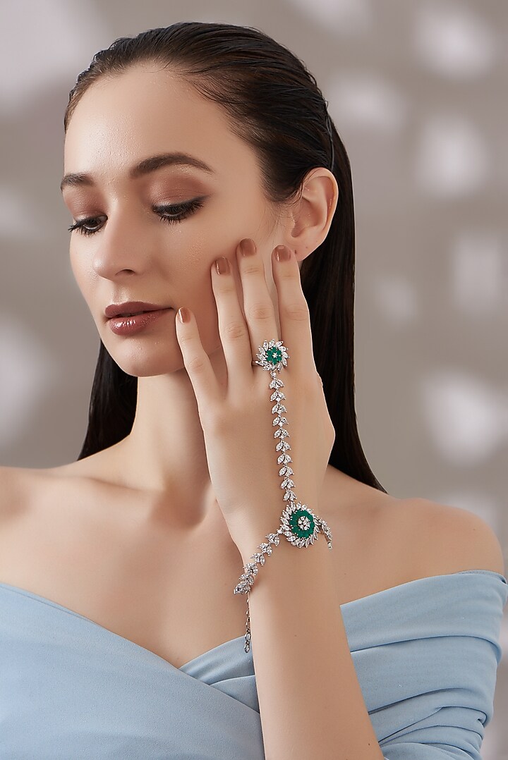 White Finish Faux Diamond & Green Stone Hathphool by Aster at Pernia's Pop Up Shop