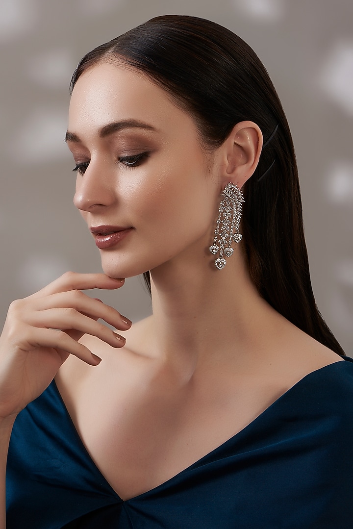 White Finish Faux Diamond Dangler Earrings by Aster at Pernia's Pop Up Shop