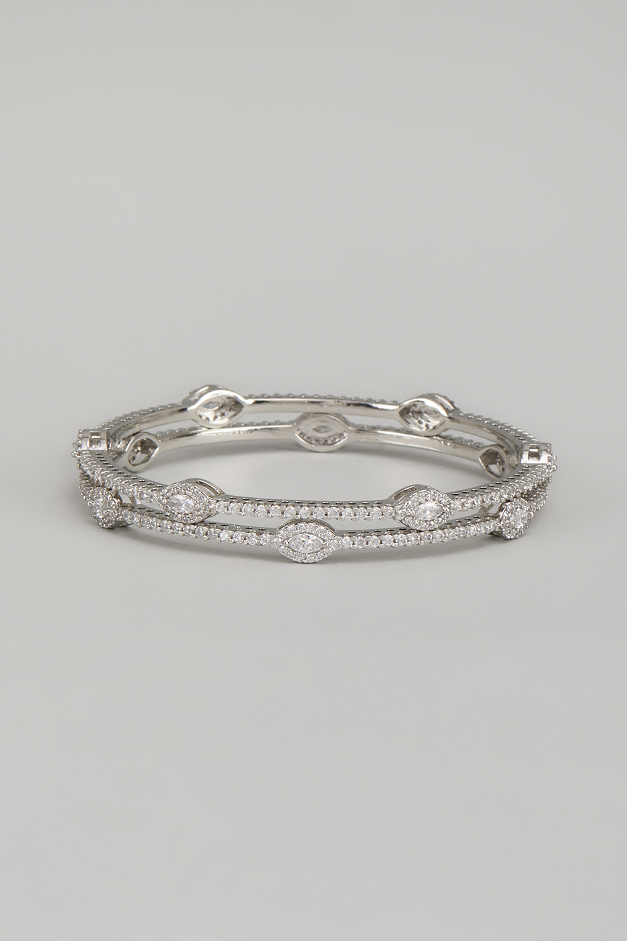White Finish Zircon Bangles (Set Of 2) by Aster at Pernia's Pop Up Shop