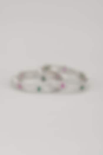 White Finish Zircon & Multi-Colored Stone Bangles (Set Of 2) by Aster at Pernia's Pop Up Shop