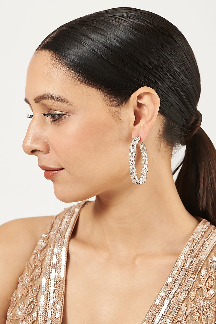 White Finish Faux Diamond Hoop Earrings by Aster at Pernia's Pop Up Shop