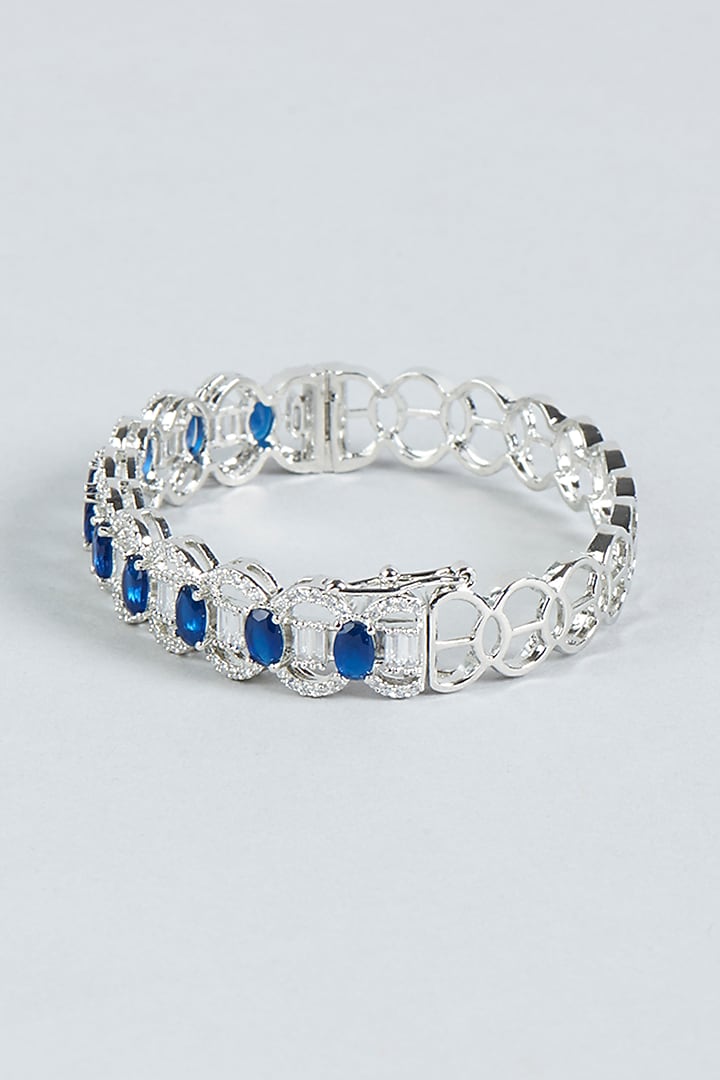 White Finish Diamond & Blue Stone Bracelet by Aster at Pernia's Pop Up Shop