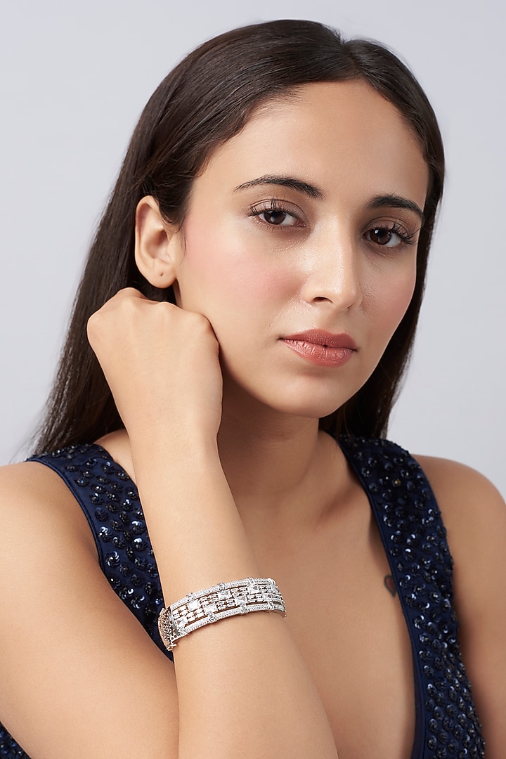 White Finish Faux Diamond Bracelet by Aster at Pernia's Pop Up Shop