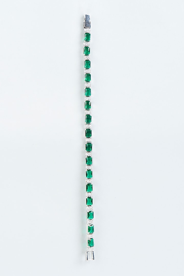 White Finish Diamond & Green Stone Tennis Bracelet by Aster at Pernia's Pop Up Shop