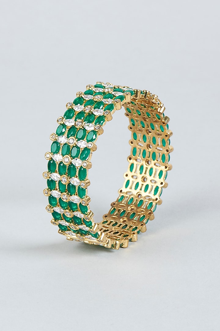 Gold Finish Bangle With Green Synthetic Stones by Aster at Pernia's Pop Up Shop