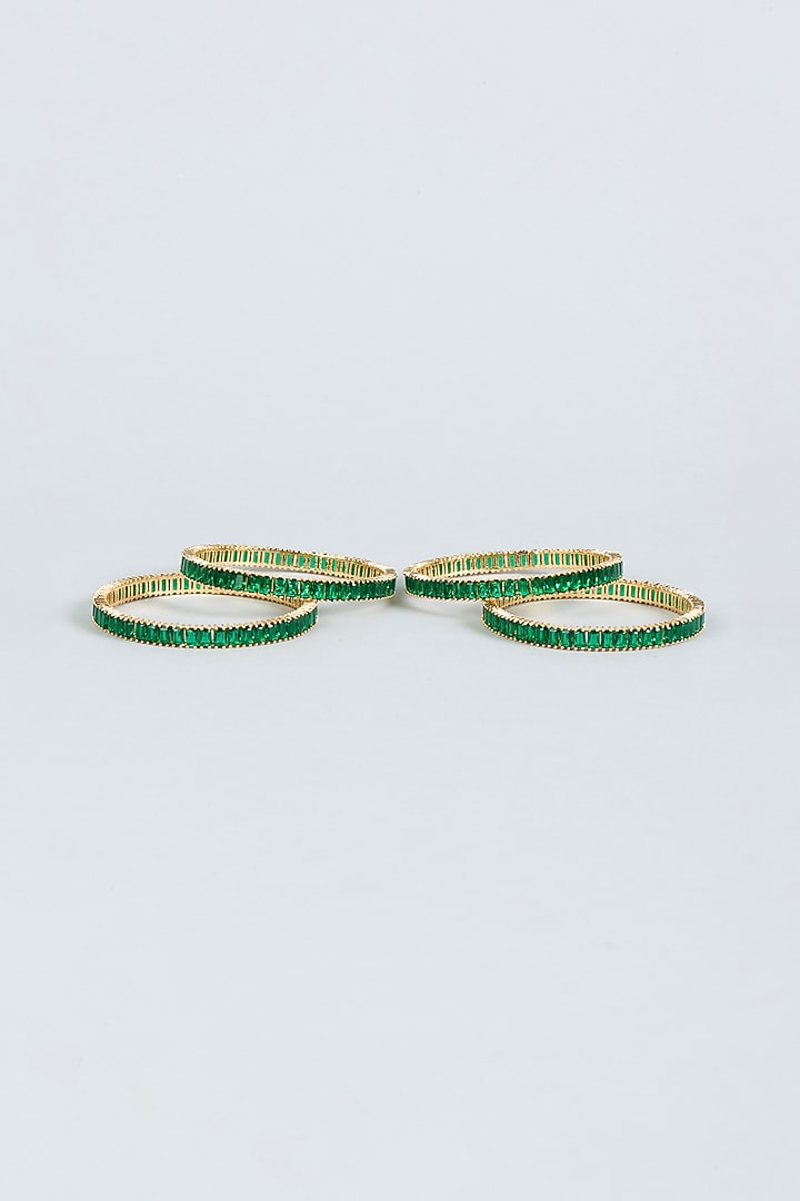Gold Finish Zircon & Green Synthetic Stone Bangles (Set Of 4) by Aster at Pernia's Pop Up Shop
