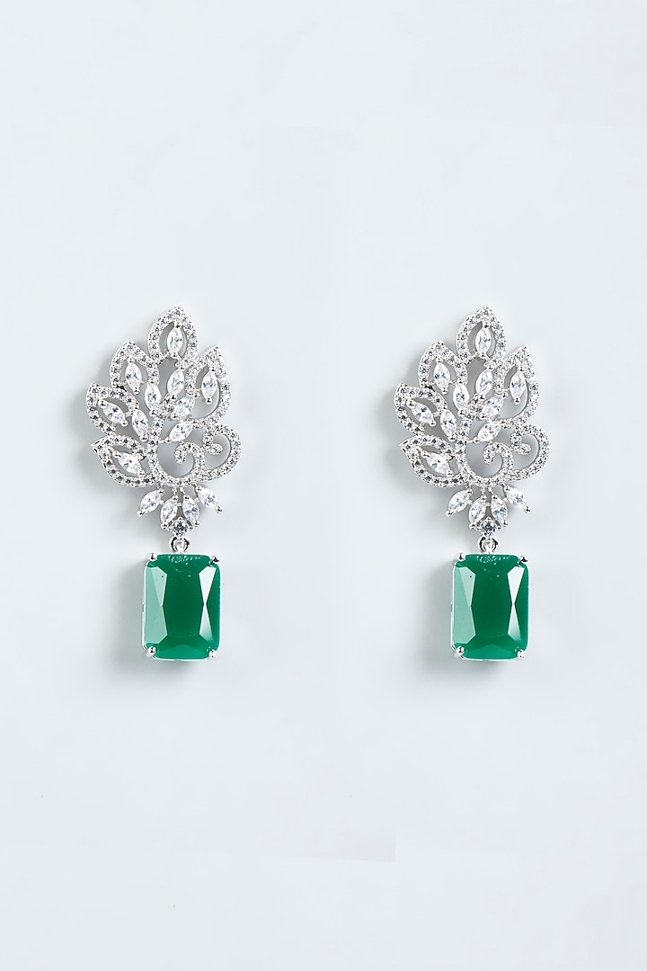 White Finish Faux Diamonds Dangler Earrings With Green Synthetic Stones by Aster at Pernia's Pop Up Shop