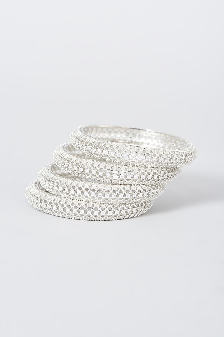 White Finish Zircon & Faux Diamond Bangles (Set of 4) by Aster at Pernia's Pop Up Shop