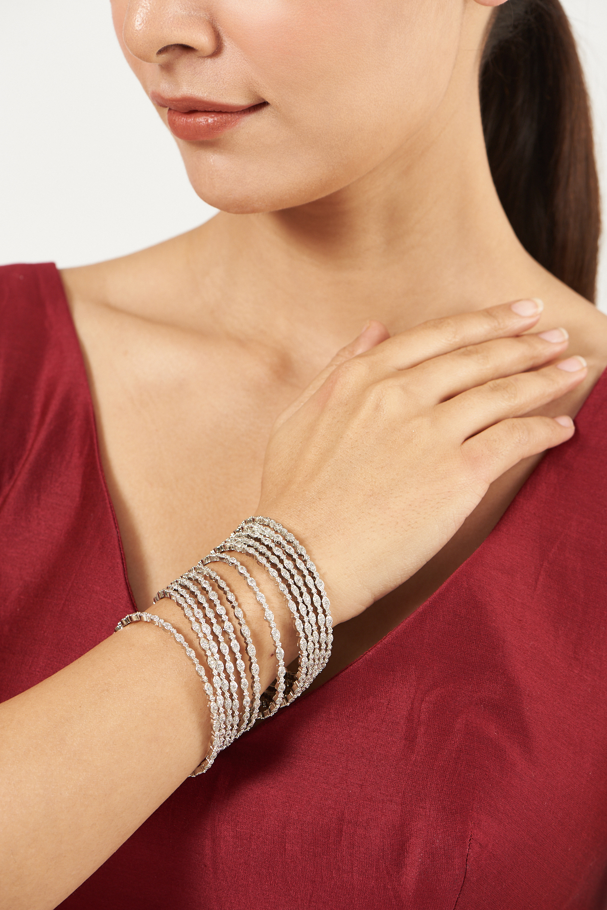 White Finish Zircon Bangles (Set of 12) by Aster at Pernia's Pop Up Shop