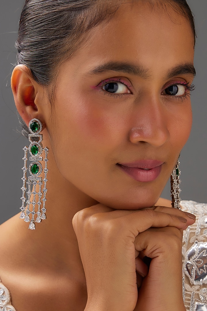 White Finish Zircon & Emerald Stone Dangler Earrings by Aster at Pernia's Pop Up Shop