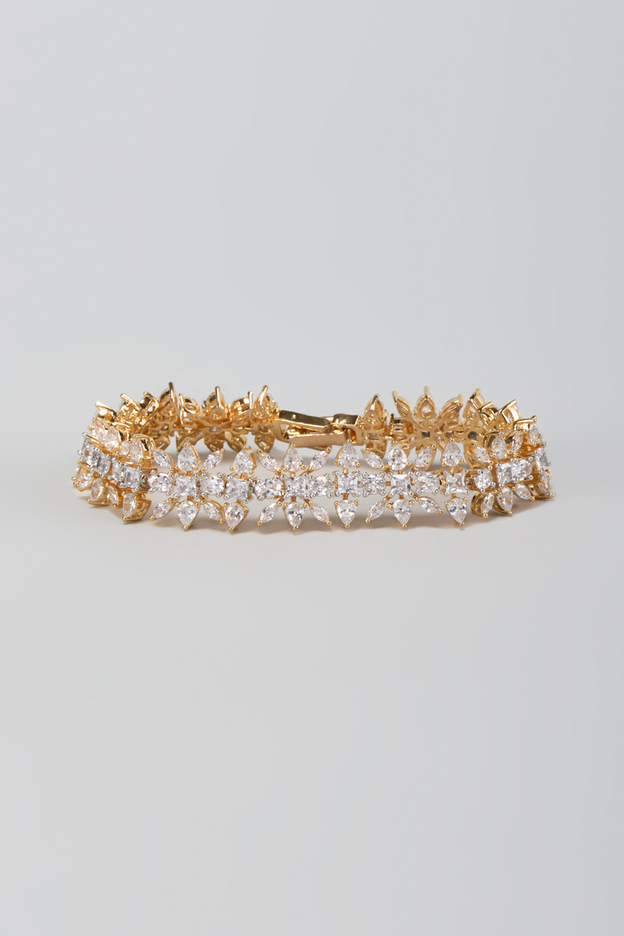 Gold Finish Zircon Openable Bracelet by Aster at Pernia's Pop Up Shop