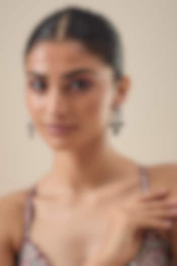 White Finish Zircon & Emerald Stone Dangler Earrings by Aster at Pernia's Pop Up Shop