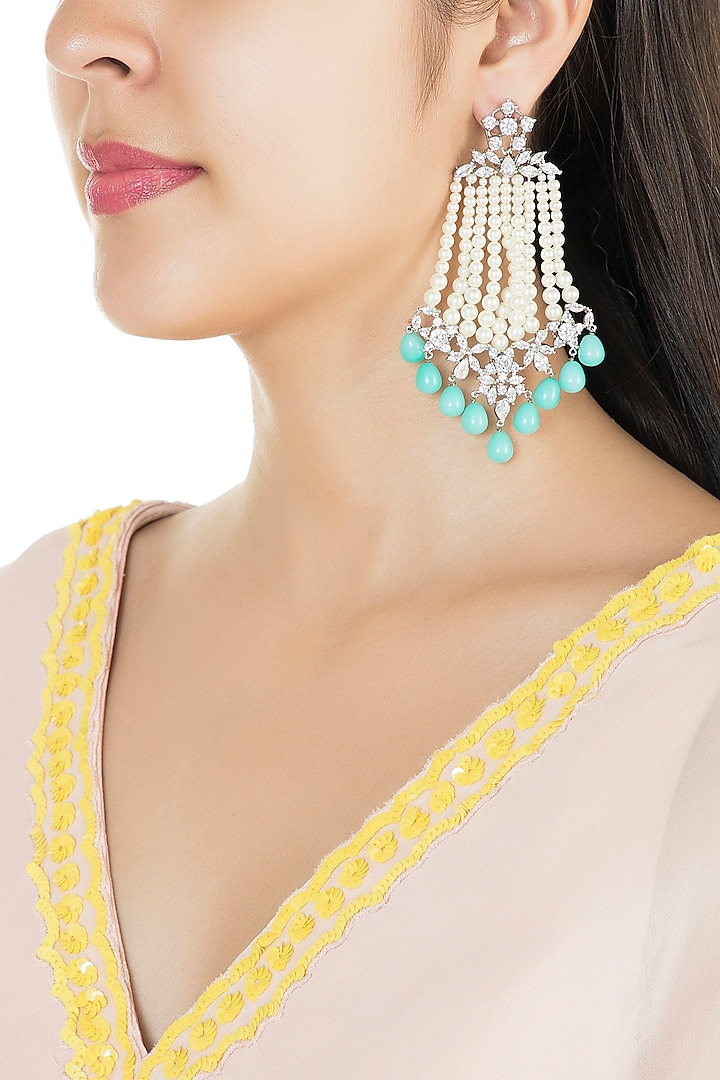 White Finish Faux Pearl Strands, Turquoise Drops & Kundan Long Dangler Earrings by Aster