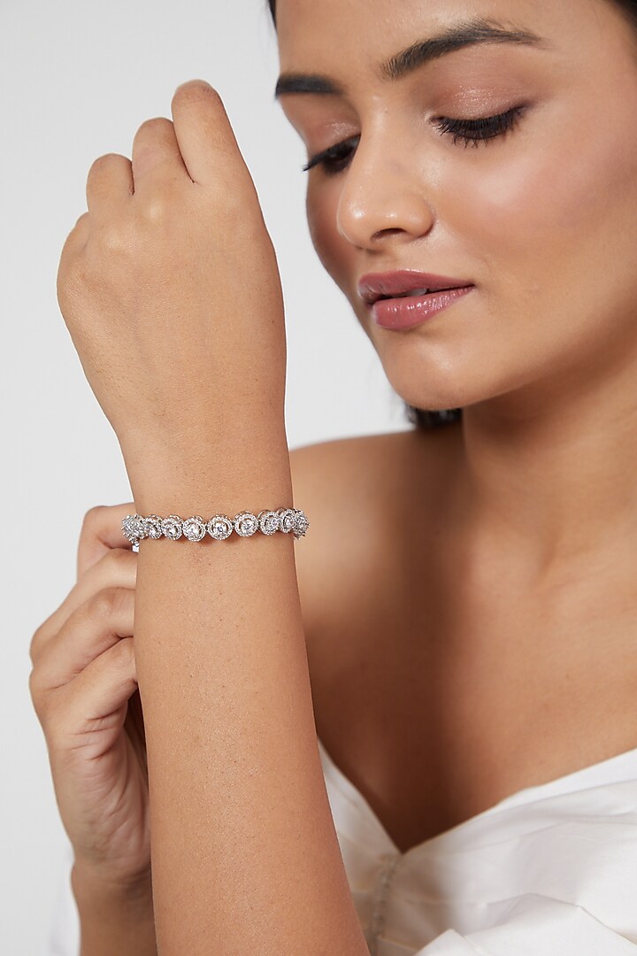 White Finish Faux Diamond Bracelet by Aster at Pernia's Pop Up Shop