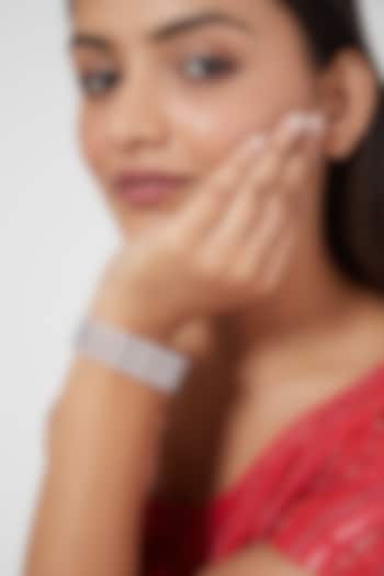 White Finish Faux Diamond Broad Bracelet by Aster at Pernia's Pop Up Shop