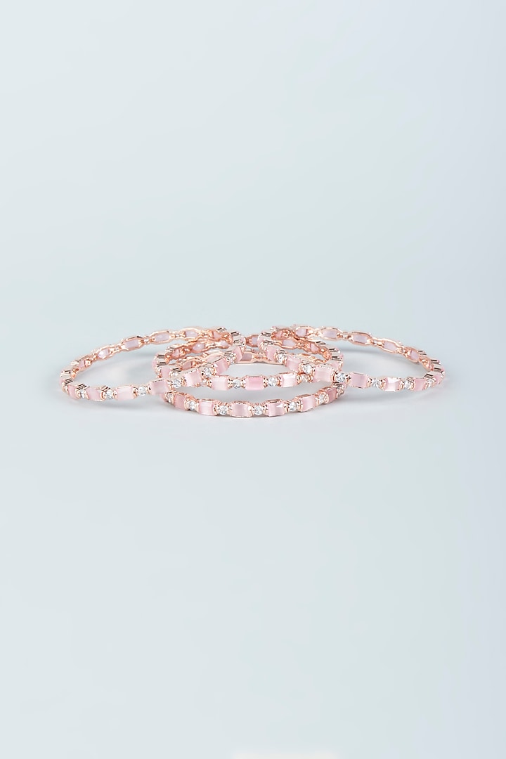 Rose Gold Finish Zircon & Pink Stone Bangles (Set of 4) by Aster at Pernia's Pop Up Shop