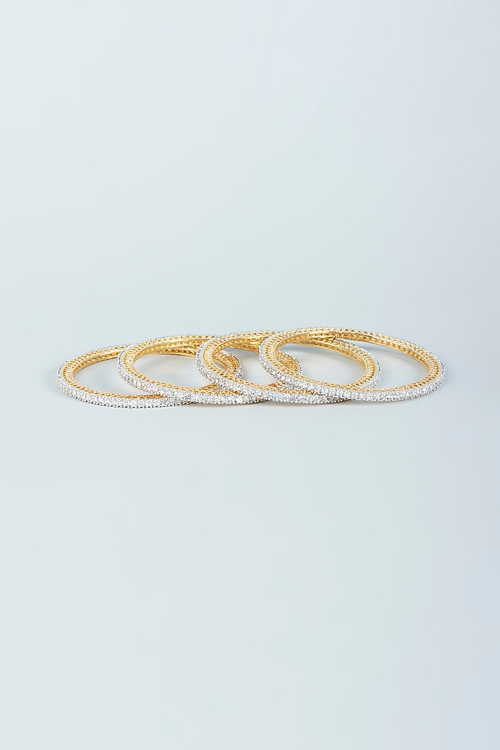 Gold Finish Zircon Bangles (Set of 4) by Aster at Pernia's Pop Up Shop