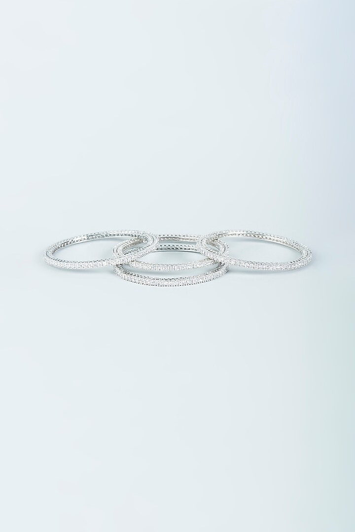 White Finish Zircon Bangles (Set of 4) by Aster at Pernia's Pop Up Shop