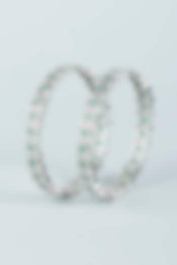 White Finish Turquoise Synthetic Stone & Zircon Bangles (Set of 2) by Aster at Pernia's Pop Up Shop