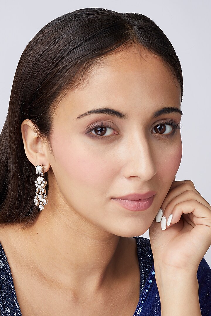 White Finish Faux Diamond Dangler Earrings by Aster at Pernia's Pop Up Shop