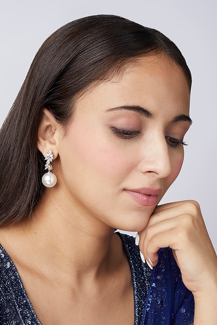 White Finish Faux Diamond & Pearl Dangler Earrings by Aster at Pernia's Pop Up Shop