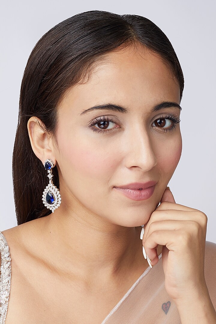 White Finish Blue Synthetic Stone Dangler Earrings by Aster at Pernia's Pop Up Shop