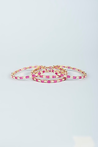 Gold Finish Red Zircons Bangles (Set of 4) by Aster