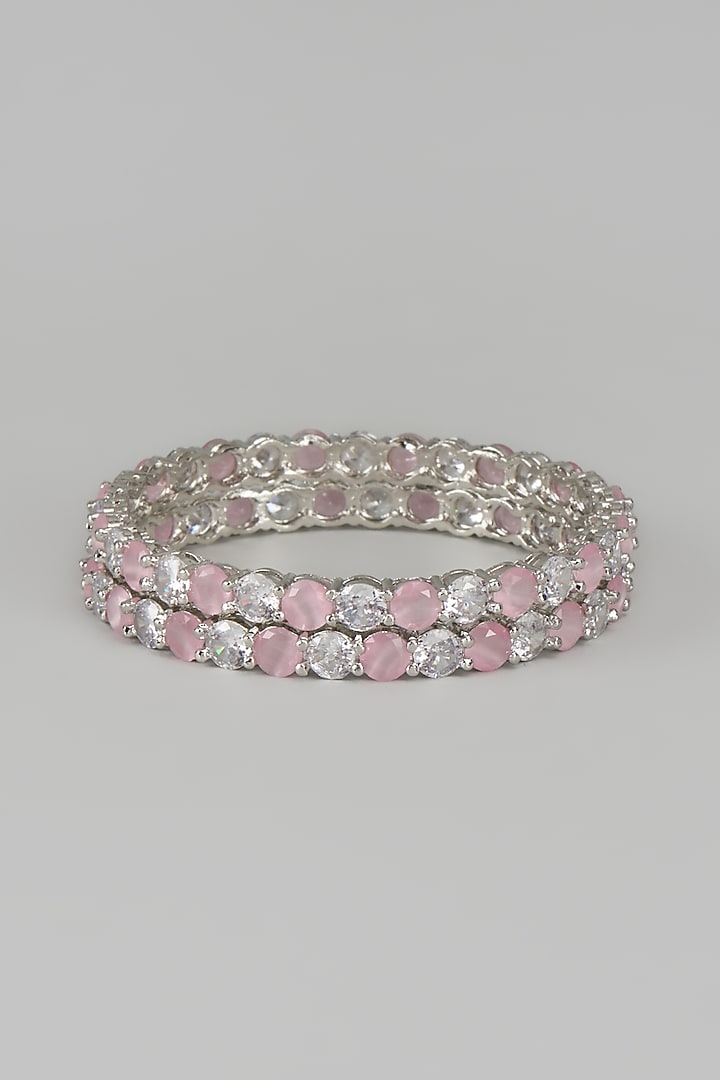 White Finish Zircon & Pink Stone Bangles (Set of 2) by Aster at Pernia's Pop Up Shop