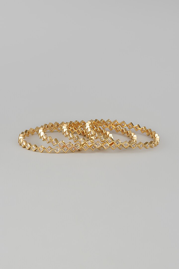 Gold Finish Zircon Bangles (Set of 4) by Aster at Pernia's Pop Up Shop