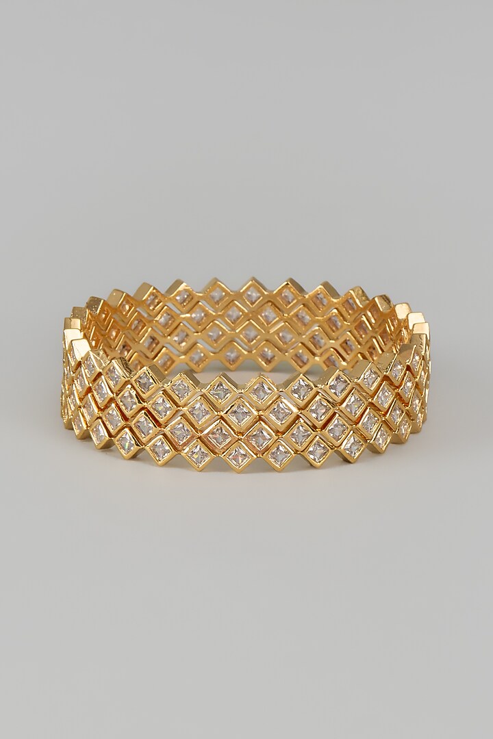 Gold Finish Zircon Bangles (Set of 4) by Aster at Pernia's Pop Up Shop