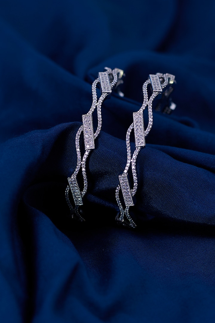 White Finish Zircon Bangles (Set of 2) by Aster at Pernia's Pop Up Shop